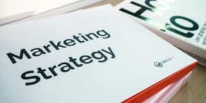 A marketing strategy book rests on a desk, highlighting key concepts of Boise print marketing for business growth.