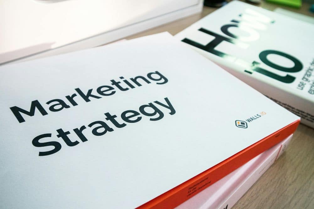 A marketing strategy book rests on a desk, highlighting key concepts of Boise print marketing for business growth.